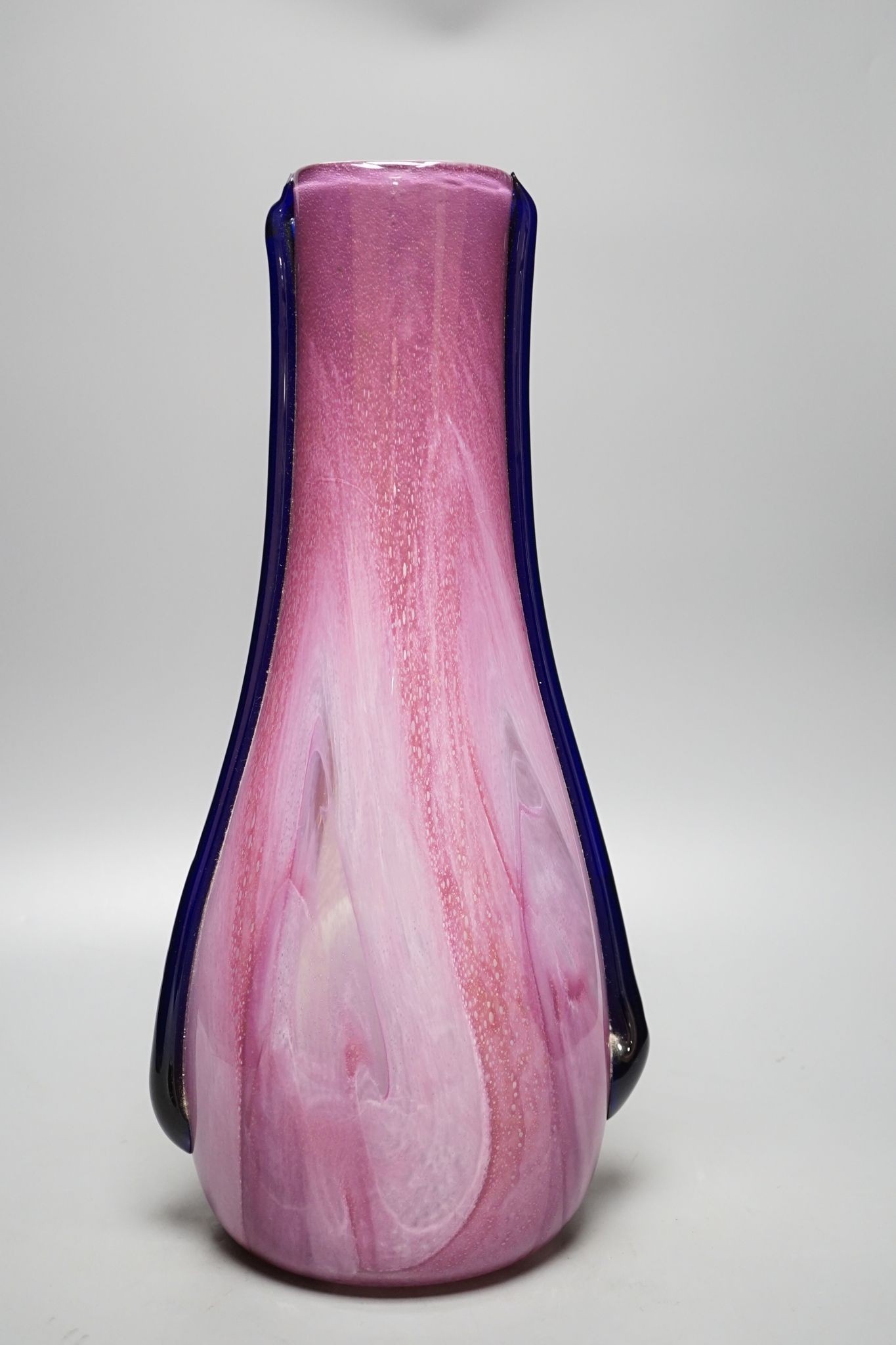 Elizabeth Graydon-Stannus, an unusual mottled pink and purple glass vase, circa 1930, of flattened pear form with applied blue lug handles, etched 'Gray-Stan' to base, 44cm high